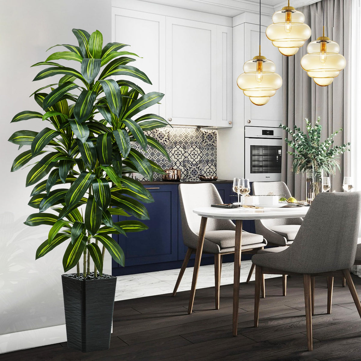 TNGGNT office corner styling with this tall faux tree boosts atmosphere.
