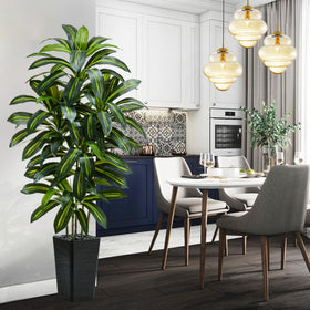 TNGGNT office corner styling with this tall faux tree boosts atmosphere.