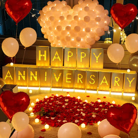 The Tobilu Happy Anniversary letters glow to create a romantic moment.