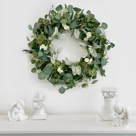 TOKCARE eucalyptus wreath with multi-textured foliage adds depth to any wall.