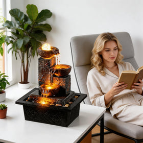 Tolevoit zen tabletop fountain on desk promotes focus and relaxation.