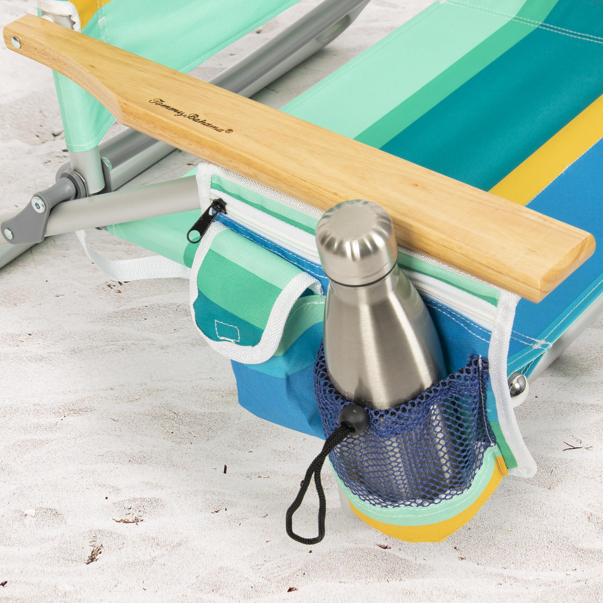 Tommy Bahama Classic Lay Flat Backpack Chair side storage pouch for small belongings.