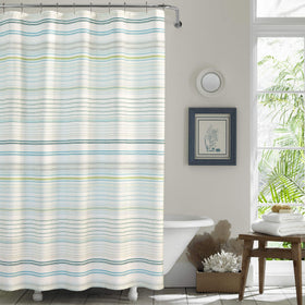 Tommy Bahama La Scala Breezer striped fabric shower curtain enhances coastal bathroom style.