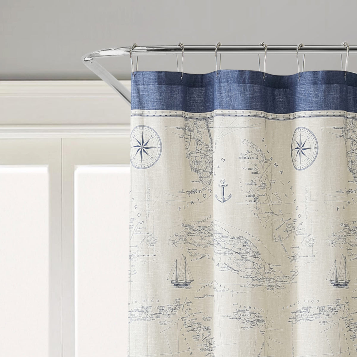 Tommy Bahama shower curtain showcases Caribbean Sea pattern with pastel blue paisley medallions.
