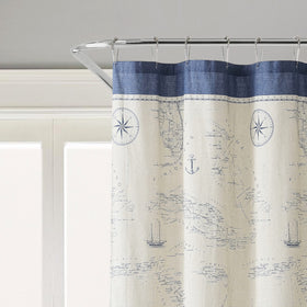 Tommy Bahama shower curtain showcases Caribbean Sea pattern with pastel blue paisley medallions.
