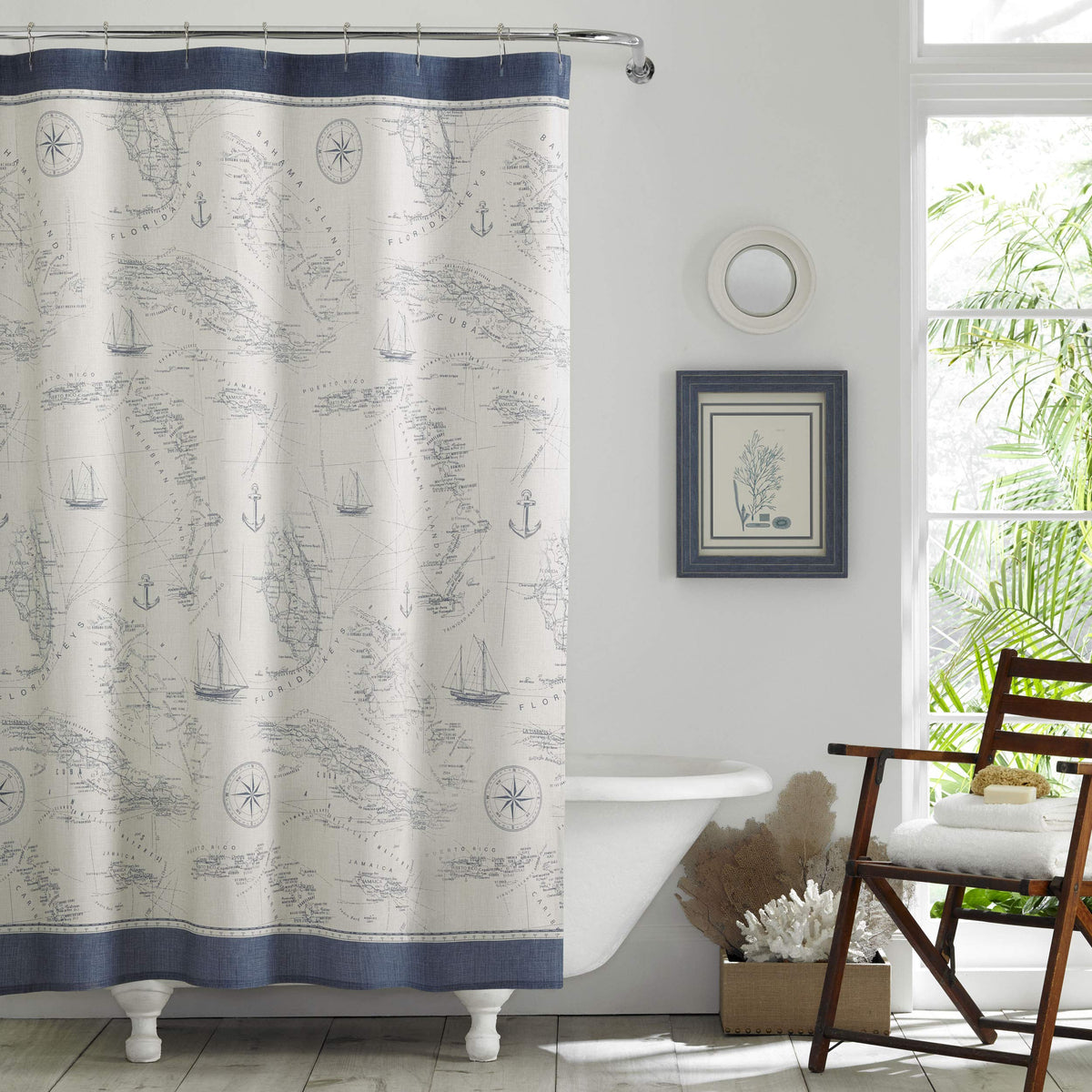 Tommy Bahama shower curtain features antique nautical map in denim blue for coastal charm.