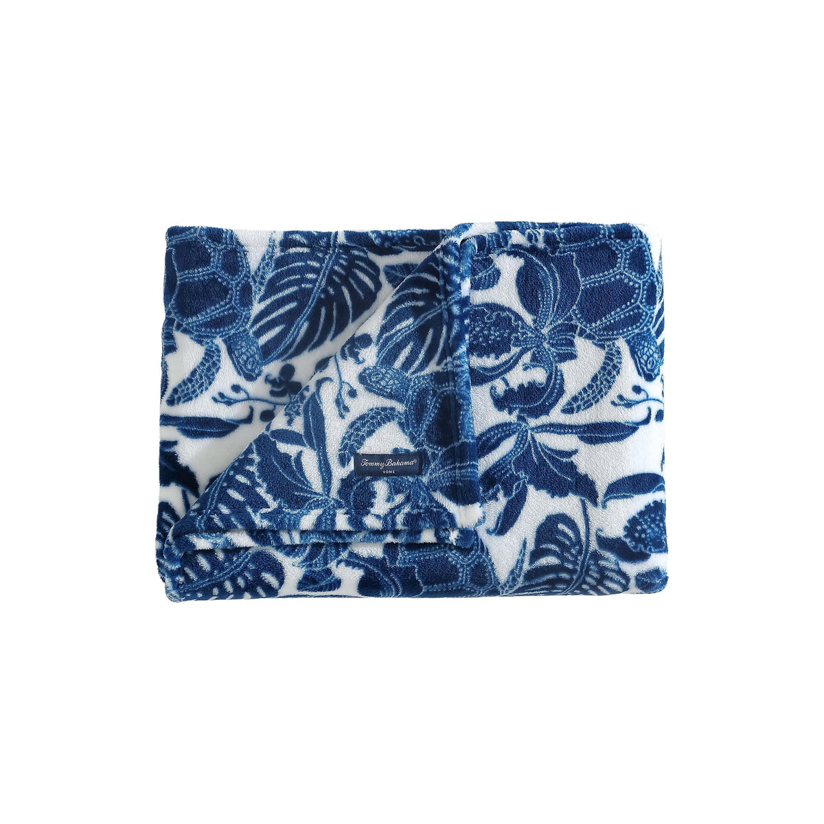 Tommy Bahama Turtle Bay Blue throw closeup shows ultra-soft fleece texture for cozy nights.
