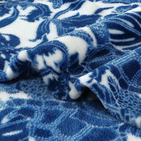 Tommy Bahama Turtle Bay Blue throw on bed adds island style and comfort.