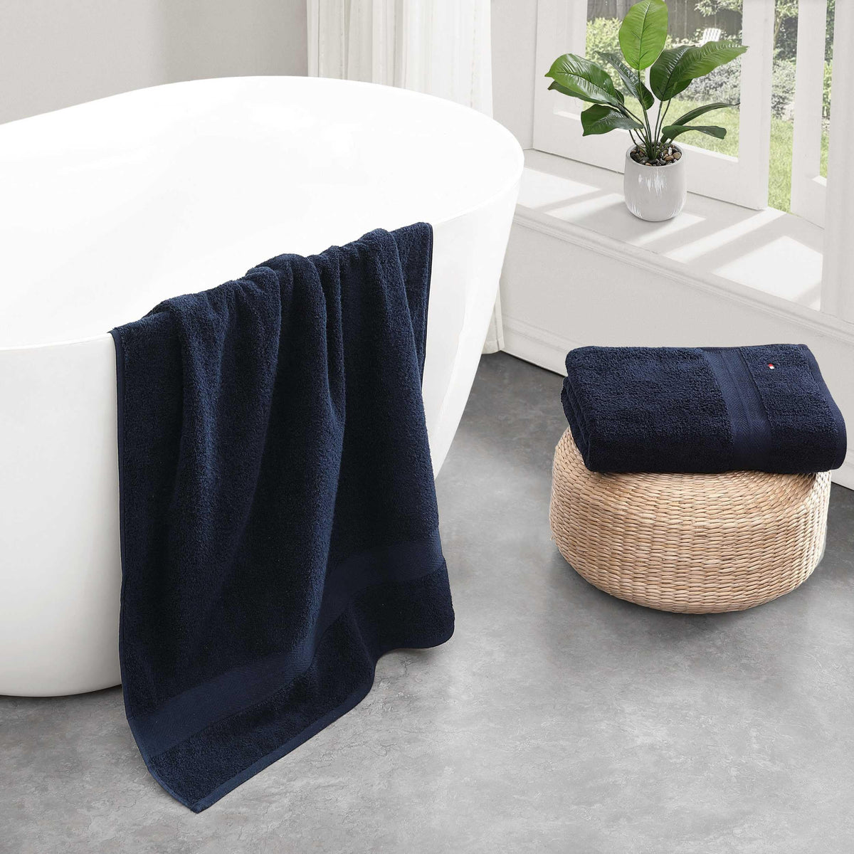 Tommy Hilfiger two-towel set ready for shared bathroom use.