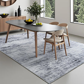 Toneed abstract grey rug in a living room enhances modern decor and defines spaces