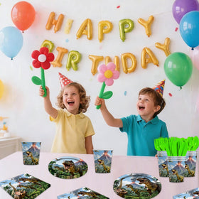 Tonyta party dino world table setting cohesive party decor