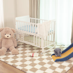 TOOHUB dorm-room decor rug adds style and softness to hard floors.