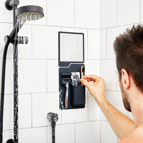 TOOLETRIES silicone grip technology mount adheres securely to glass and tile.