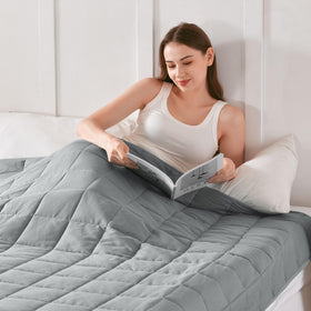 Topblan twin-size blanket covering a bed for cooling comfort
