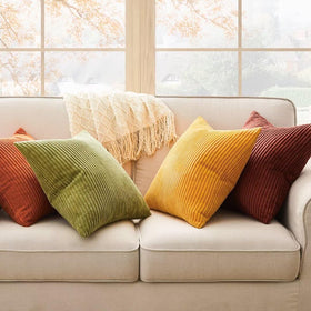 Topfinel four-piece gradient cushions on a sofa.
