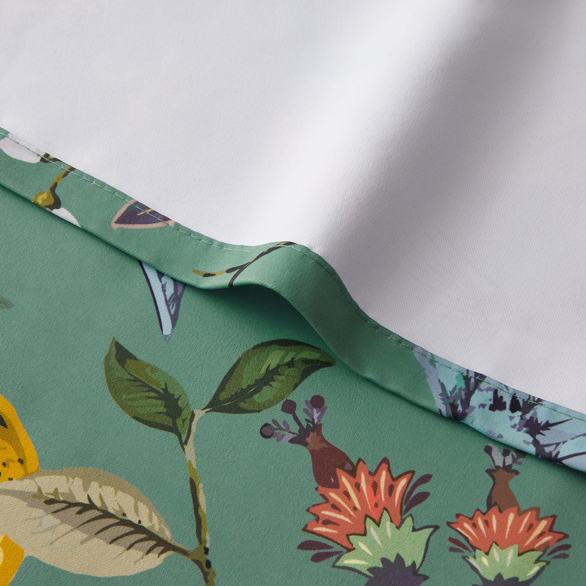 Topfinel two-panel grommet curtains install easily with eight rings per panel.