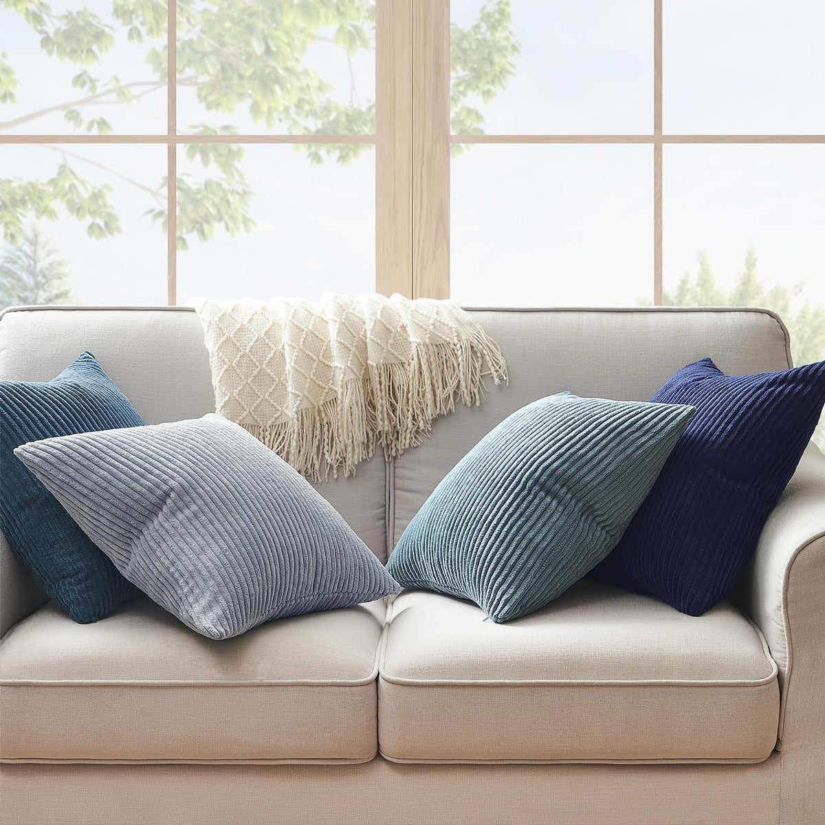 Topfinel pillow covers brighten a modern living room setup.