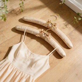 TOPIA HANGER champagne gold finish enhances wardrobe aesthetics with a luxe look.