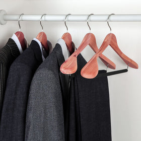 TOPIA HANGER cedar wood absorbs moisture and odors for freshness.