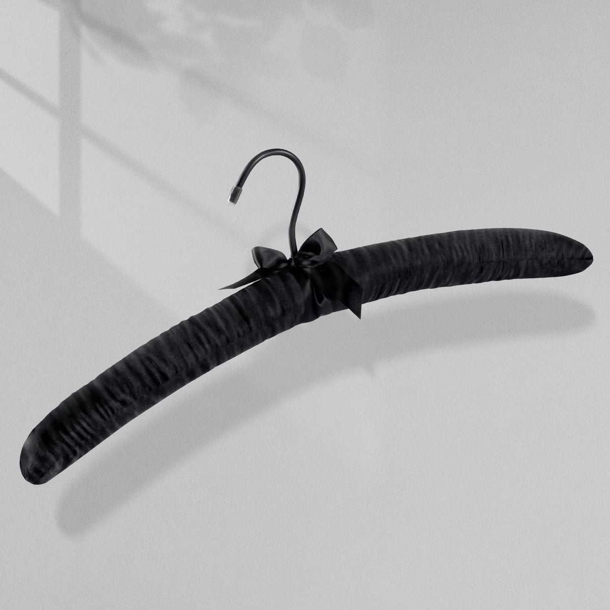 TOPIA HANGER satin bow accent adds elegant detail to any closet.