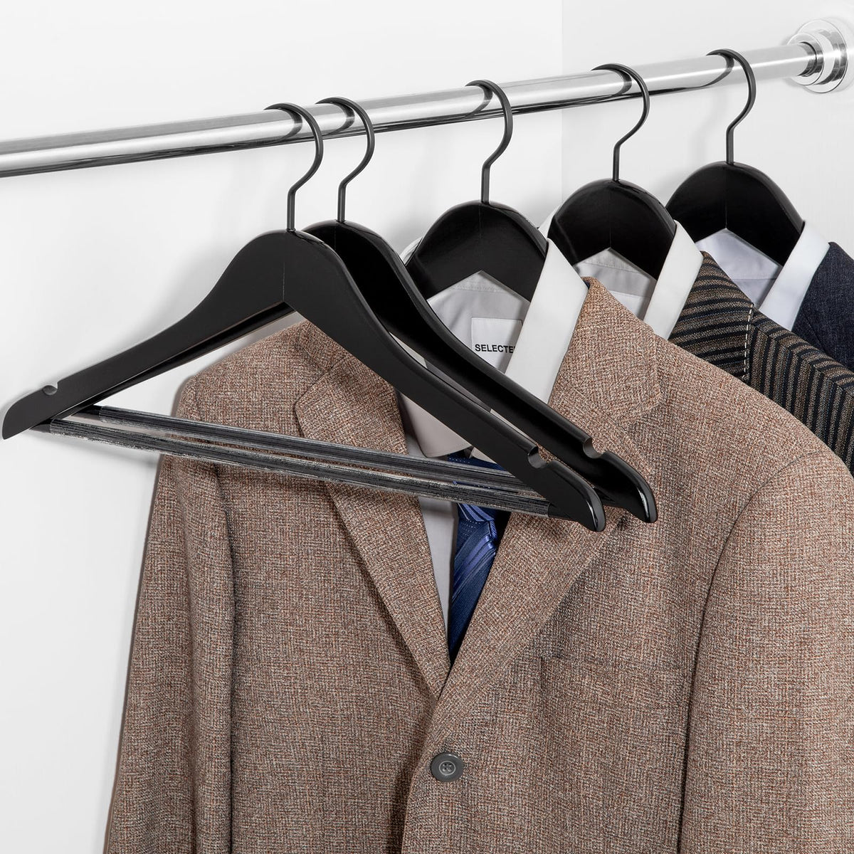 TOPIA HANGER screw-fixed design enhances strength for heavier garments.