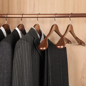 TOPIA HANGER smooth natural finish adds elegant touch to closets.