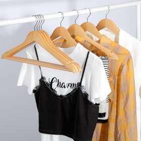 TOPIA HANGER notches accommodate camisoles and strap garments securely.