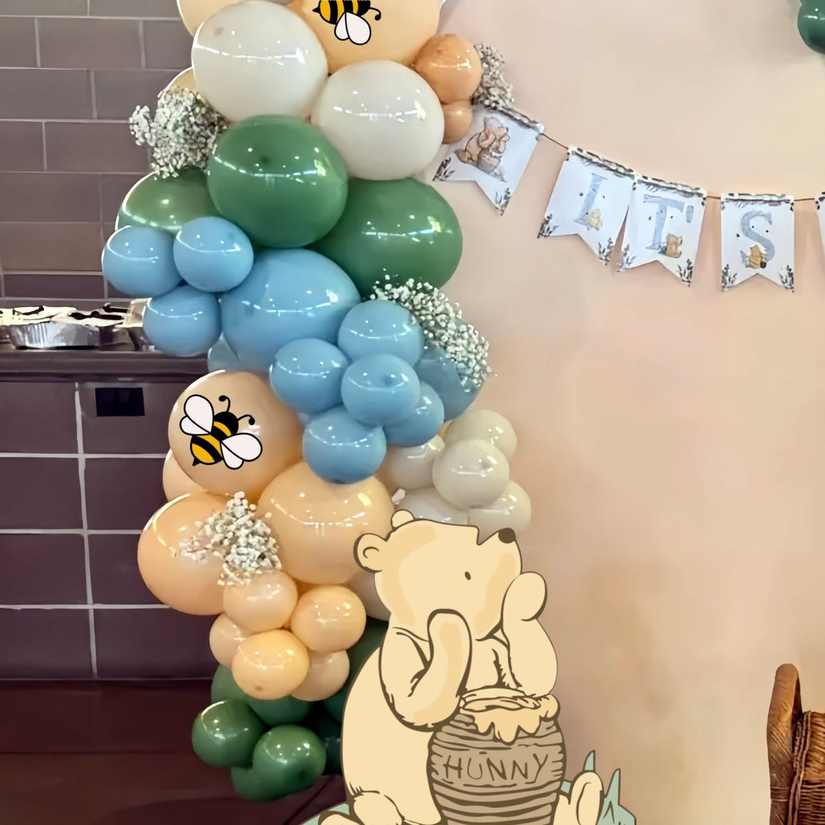 TopJianyu Pooh cutout with stand doubles as a photo prop.