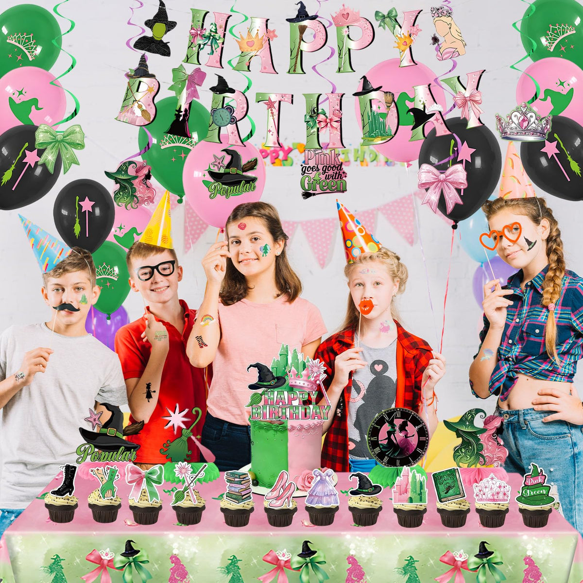 Topthy cake toppers complete the dessert display with coordinated witch motifs.