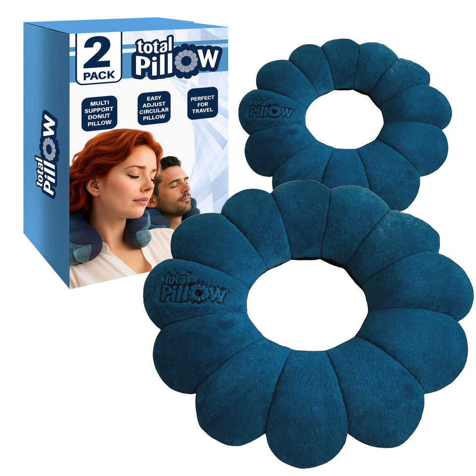 Total Pillow donut pillow on an airplane, offering neck and head support for flight comfort