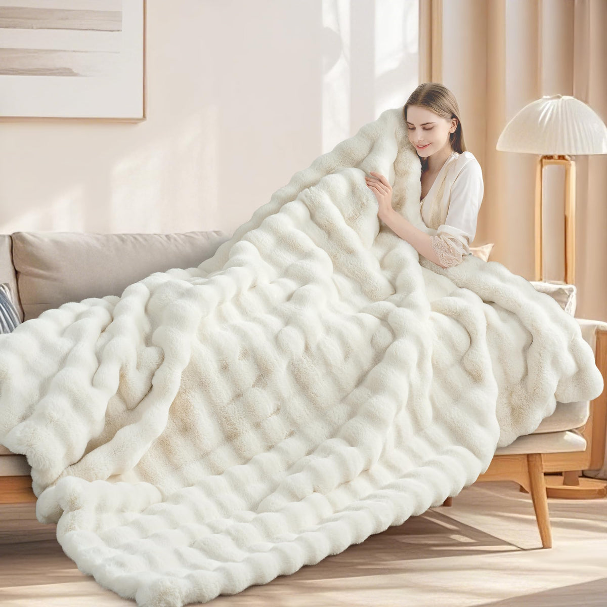 Touchat cream white throw adds soft luxury to living spaces