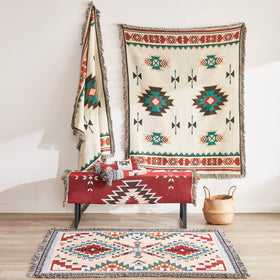 Touchat Native American Blanket on a bed adds texture and cozy layering.