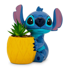 Toynk pineapple planter close-up shows faux succulent for tropical ambiance.