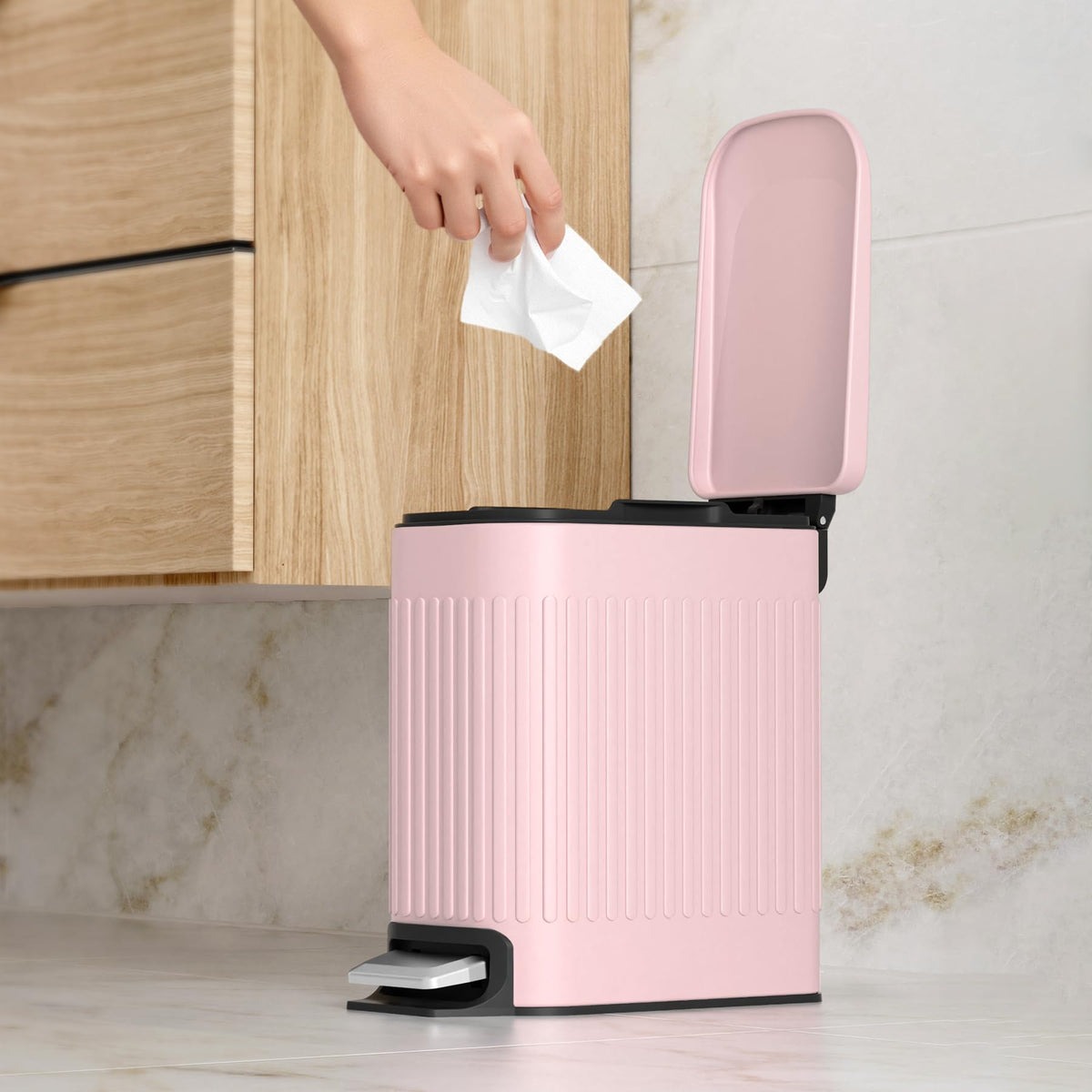 TrashAid pink soft-close lid reduces noise for quiet rooms.