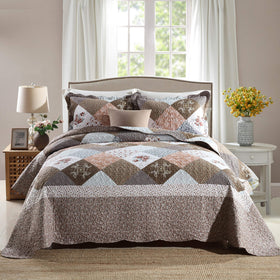 Travan 3-Piece Queen Quilt Set on bed shows oversized cozy microfiber comfort