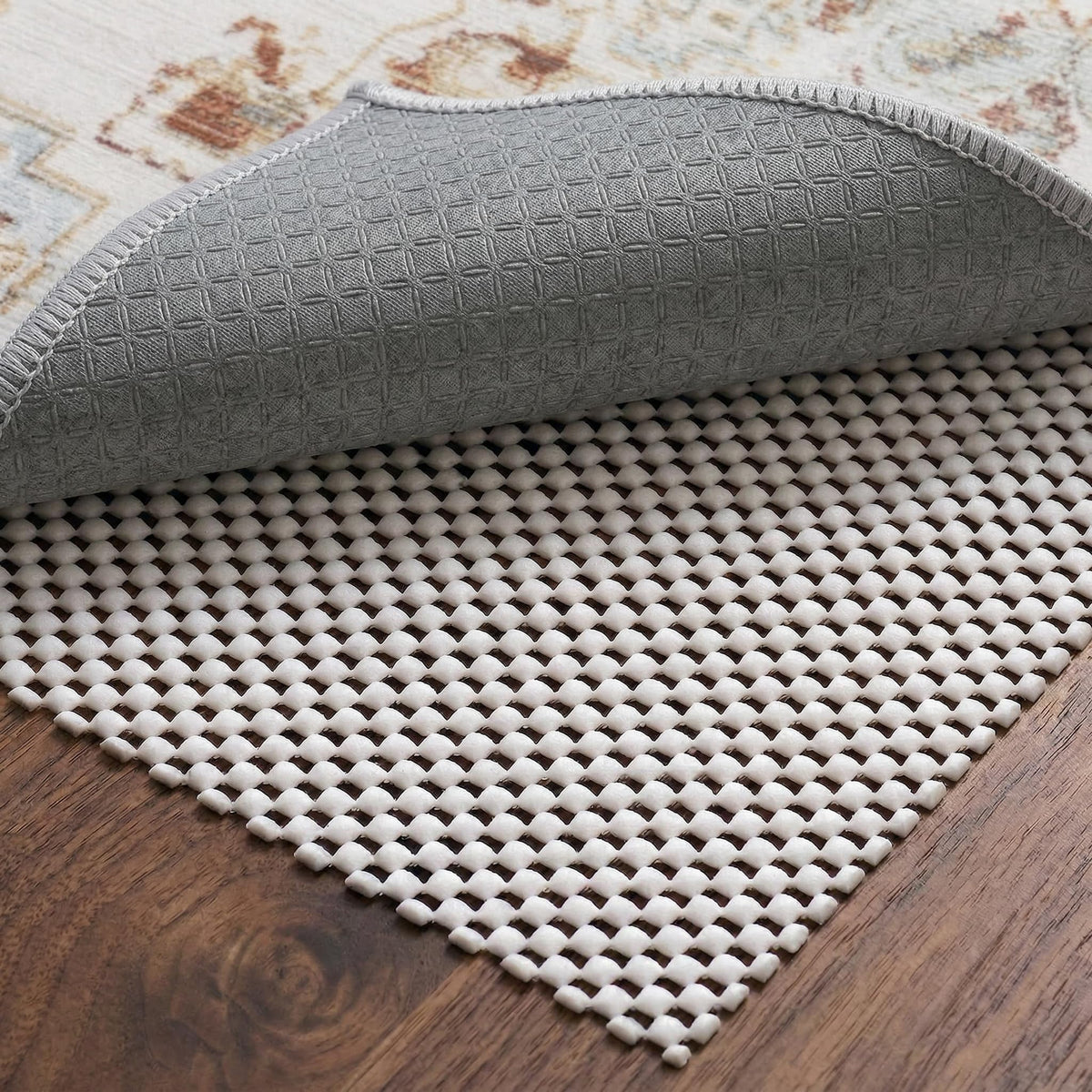 TravLand non-slip rug pad 9x12 front view showing secure grip on hardwood floors