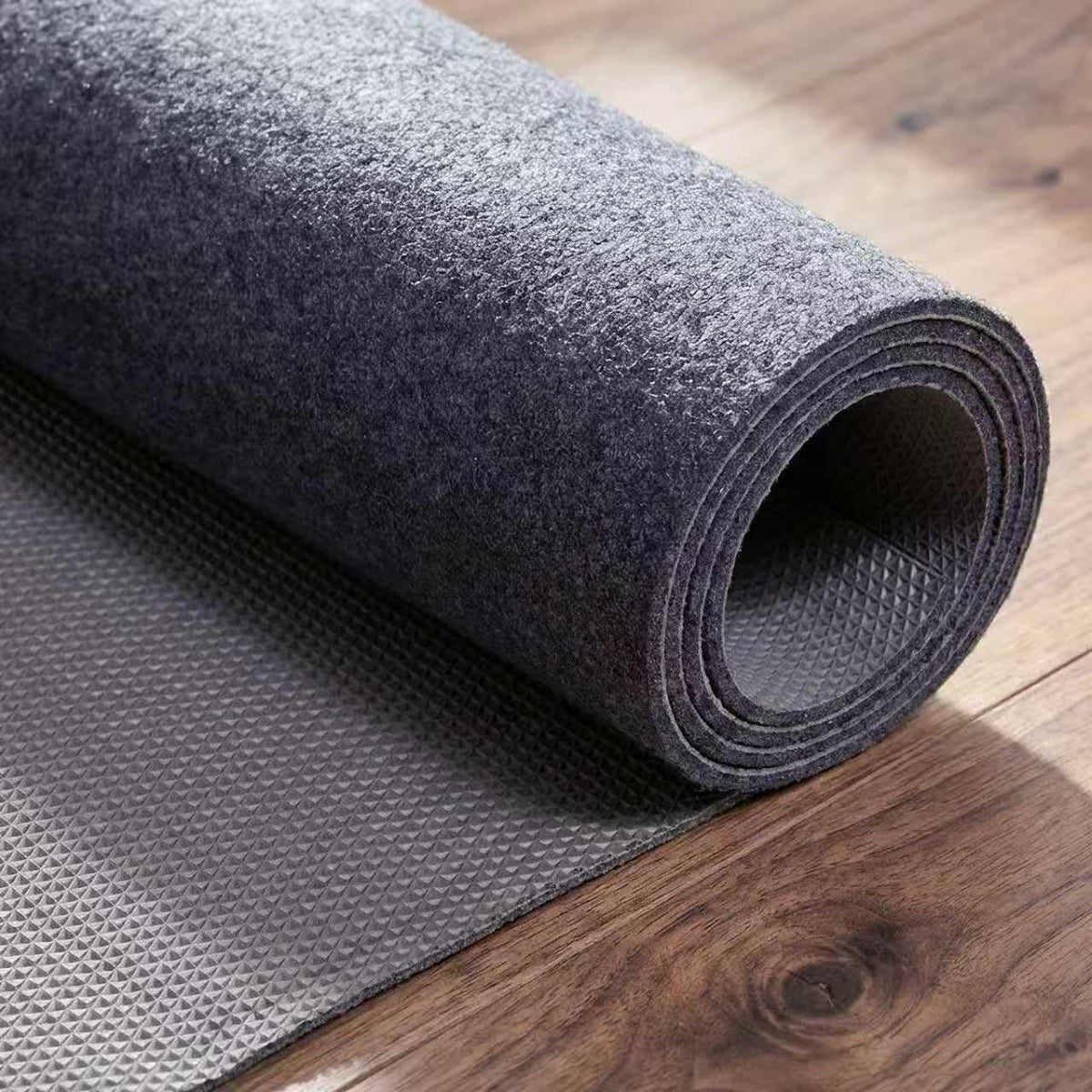 TravLand rug pad 6x9 rubber base demonstrates waterproof protection.