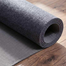 TravLand rug pad 6x9 rubber base demonstrates waterproof protection.