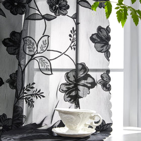 Treatmentex rose embroidery adds texture and visual interest.