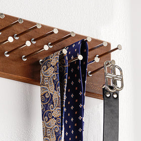 Closeup of TreeHouse London walnut finish on tie rack showing premium detail.