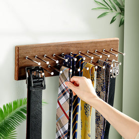 TreeHouse London tie rack mounted in a bedroom closet for easy access.