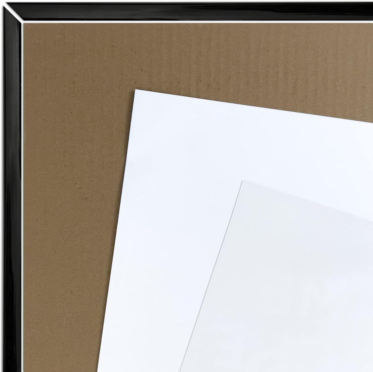 Trends International Allposters frame assembly and protection using styrene sheet and backer.