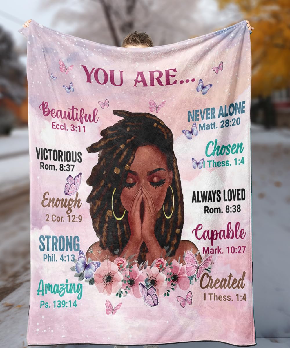 Close-up of TRENDYNEST fleece fabric and printed quotes for daily motivation.