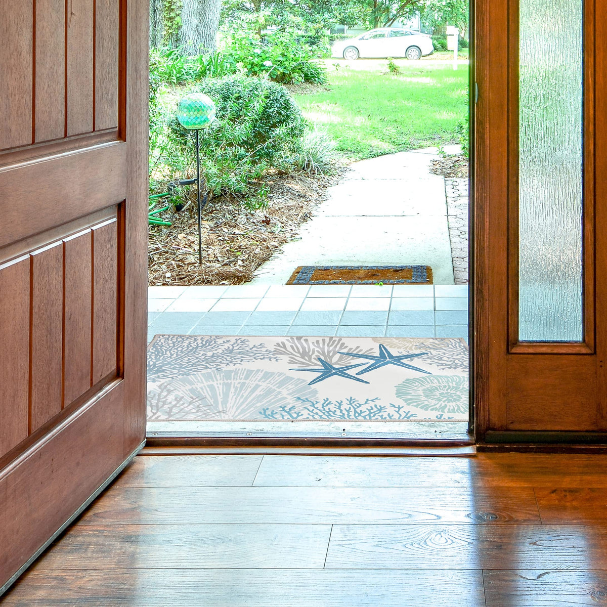 Tritard coastal area rug ideal for entryways and laundry rooms.
