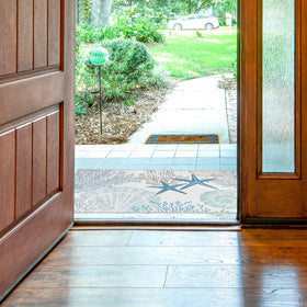 Tritard coastal area rug ideal for entryways and laundry rooms.