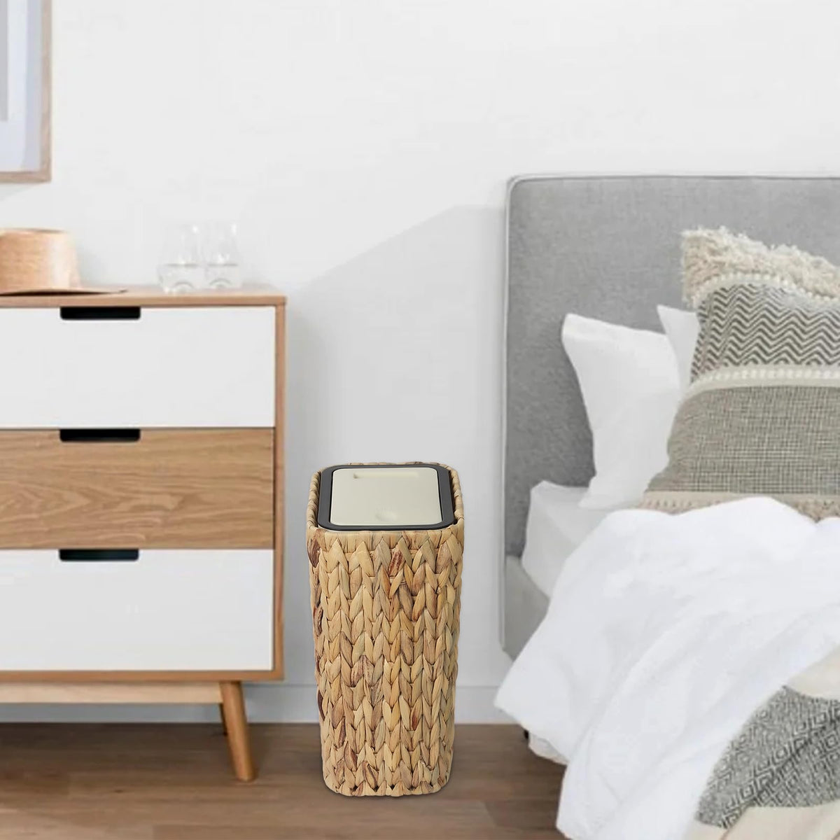 Trongee discreet wastebasket keeps bedroom clutter out of sight.