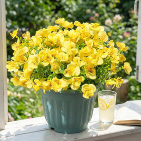 Trytuny artificial yellow flowers outdoor 12-pack, sturdy and weather-proof for porch displays.