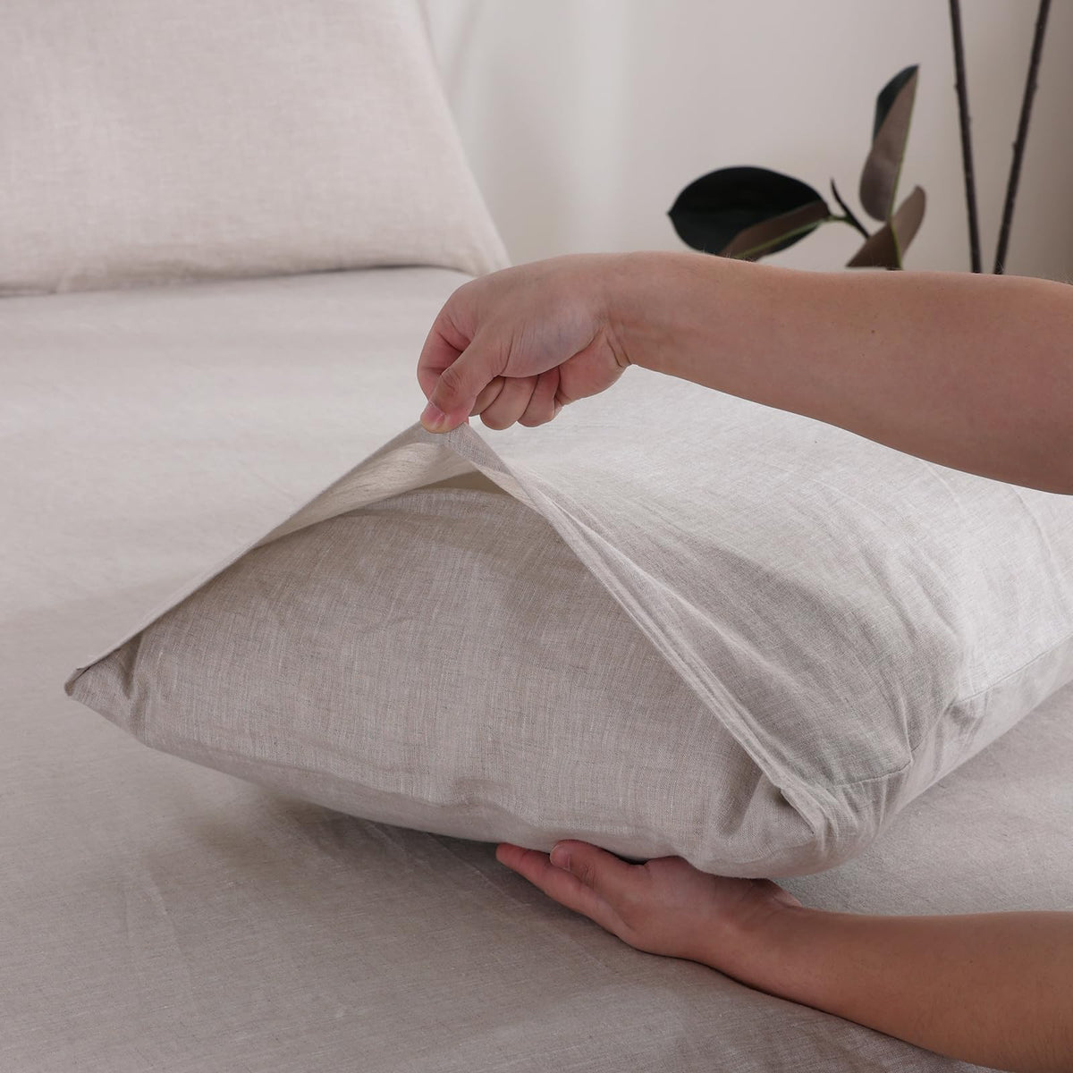 Tseapeni linen pillowcase envelope closure keeps pillows secure.