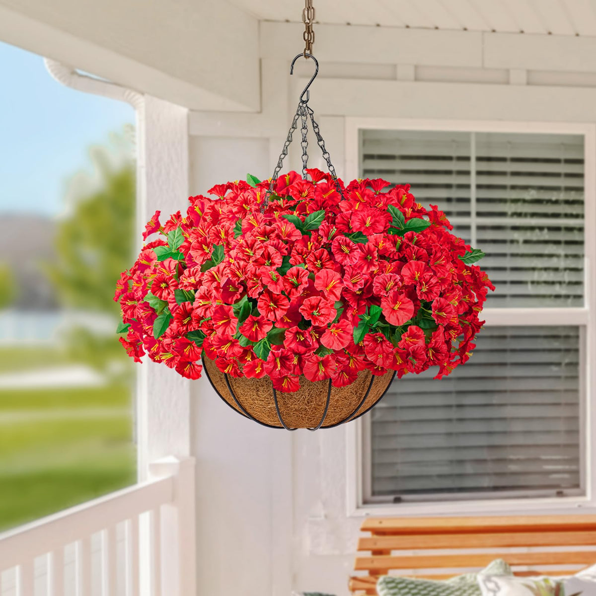 Evening light on TTQ porch display with vivid blooms.