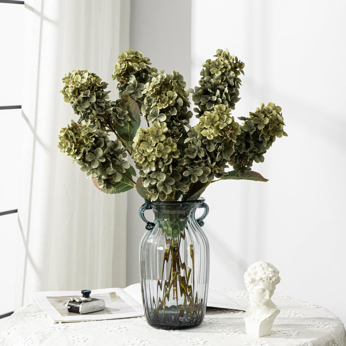 Outdoor-friendly faux hydrangea by Ttranewsoo maintains color outdoors.